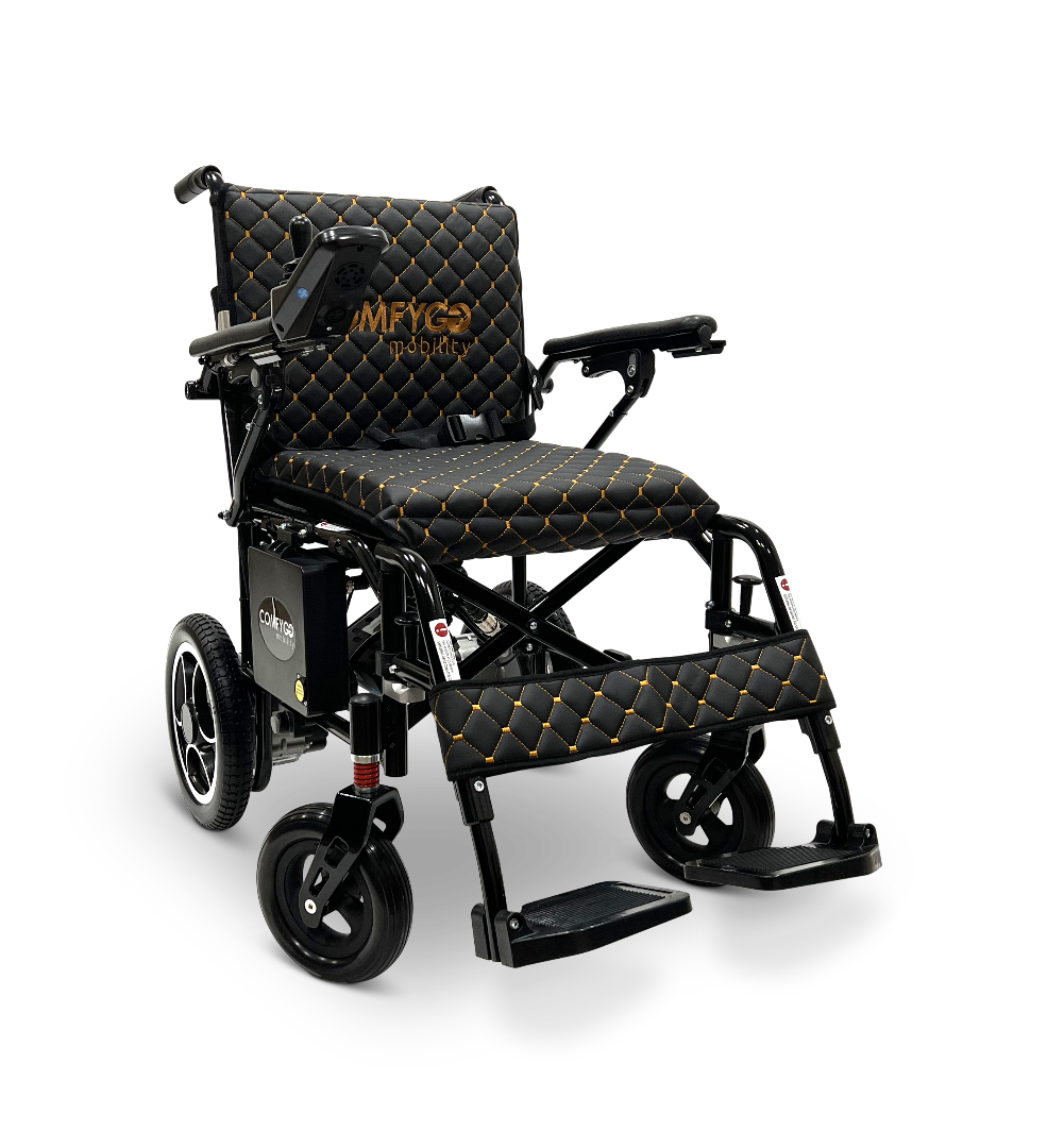 The ComfyGo X-7 Lightweight Foldable Electric Wheelchair, in black and gold with a quilted design, features footrests and a right-armrest control panel. Its lightweight at just 40 lbs, portable with powerful motors, and is shown against a white backdrop.
